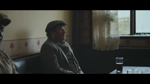 Beat 11: Man in cap looks up