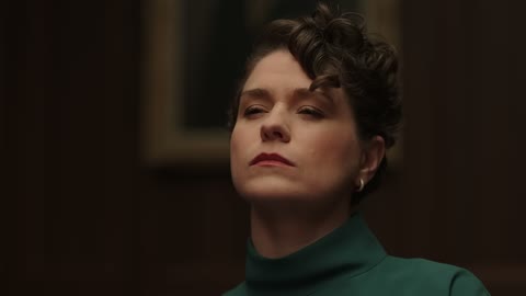 Beat 9: Green woman smirks