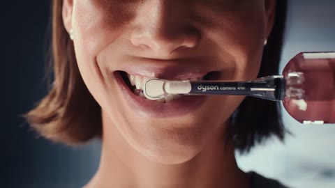 Beat 6: Brush held to camera