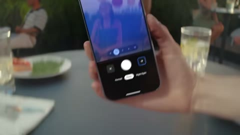 Beat 2: Hand lifts phone