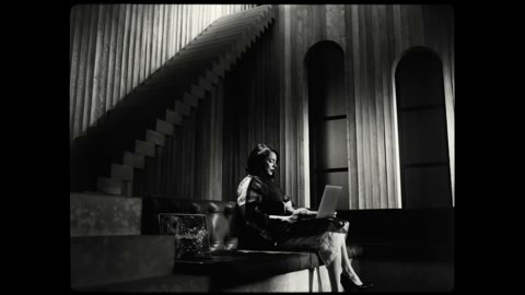 Beat 10: Sits with laptop