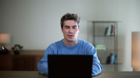 Beat 1: Man at laptop