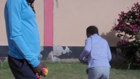 Beat 6: Smiling with child